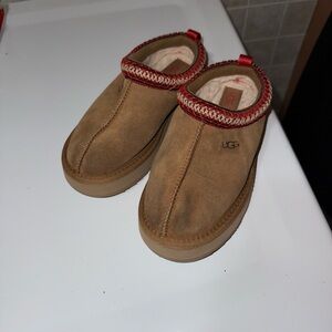 UGG Tan Suede Slip-Ons with Red Trim